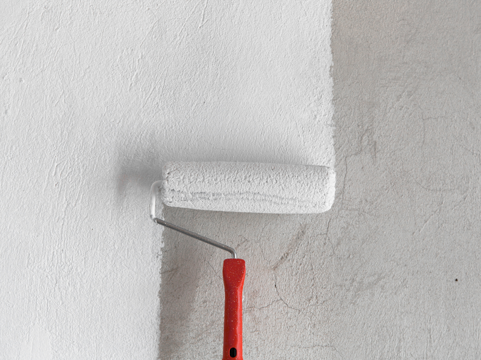 A Professional Red Paint Roller With White Paint - Asian Paints