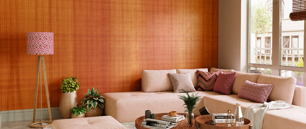 A completely furnished living room decorated with a sofa, coffee table, and floor lamp against a wall with special effects.