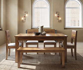 A dining room with wooden table, chairs and bench. Carpenters by Asian Paints.