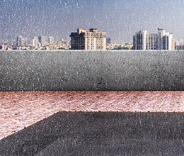 A scene of a rainfall on a building terrace. Waterproofing contractor by Asian Paints