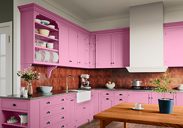 Adorable Dining Room with Pink Cabinets