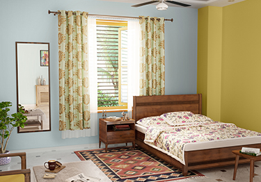 Contemporary Master Bedroom with a Yellow Wall